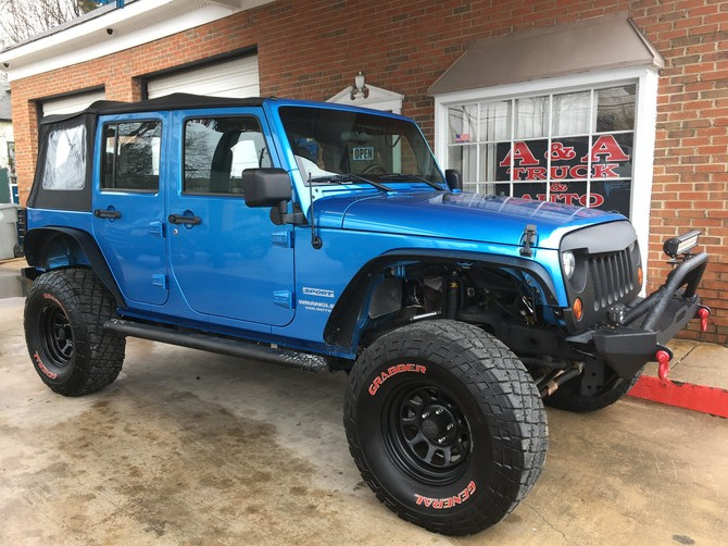 Armyboy's 2010 Jeep Wrangler Unlimited Sport