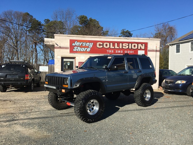 1999 Jeep Cherokee Sport Toyo Open Country M/T 35/13.50R15 (2238)