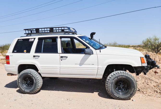 1998 Jeep Grand Cherokee Laredo Dick Cepek Trail Country EXP 31/10.50R15 (6136)
